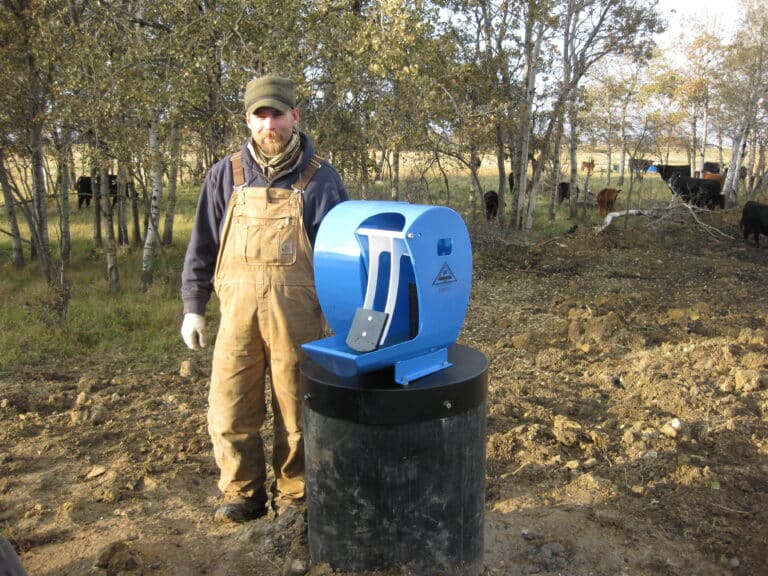 solar cattle water pump system - Frostfree Nosepumps - picture of crew and pump system