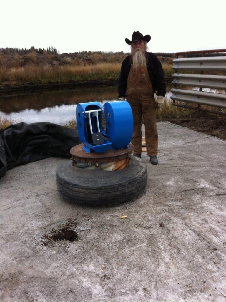 solar cattle water pump system - Frostfree Nosepumps - picture of crew and pump system