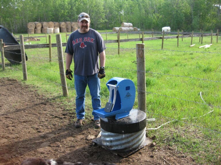 livestock water pump system - Frostfree Nosepumps - picture of pump and crew